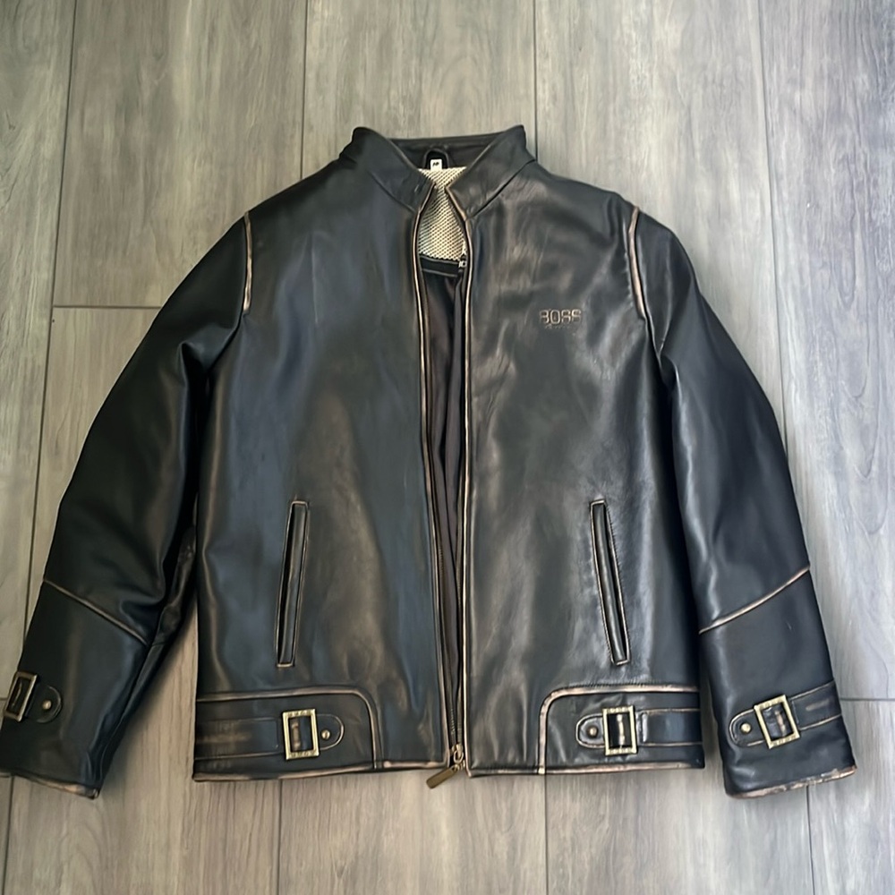 Pre- owned Hugo Boss kids leather jacket in great condition.